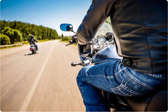 a man riding a motorcycle