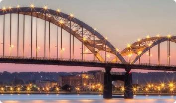 a bridge with lights at night