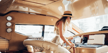 a woman driving a boat