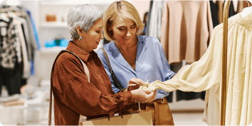 two women shopping for clothes