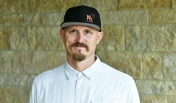 Mick Ebeling wearing a hat