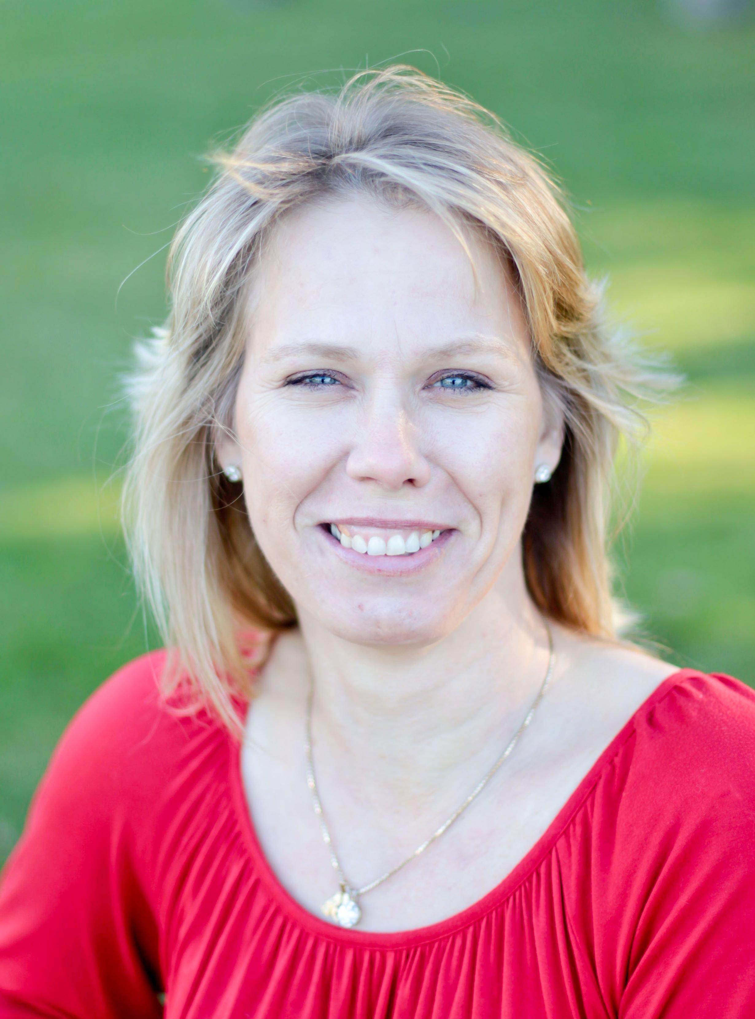 a woman smiling for the camera