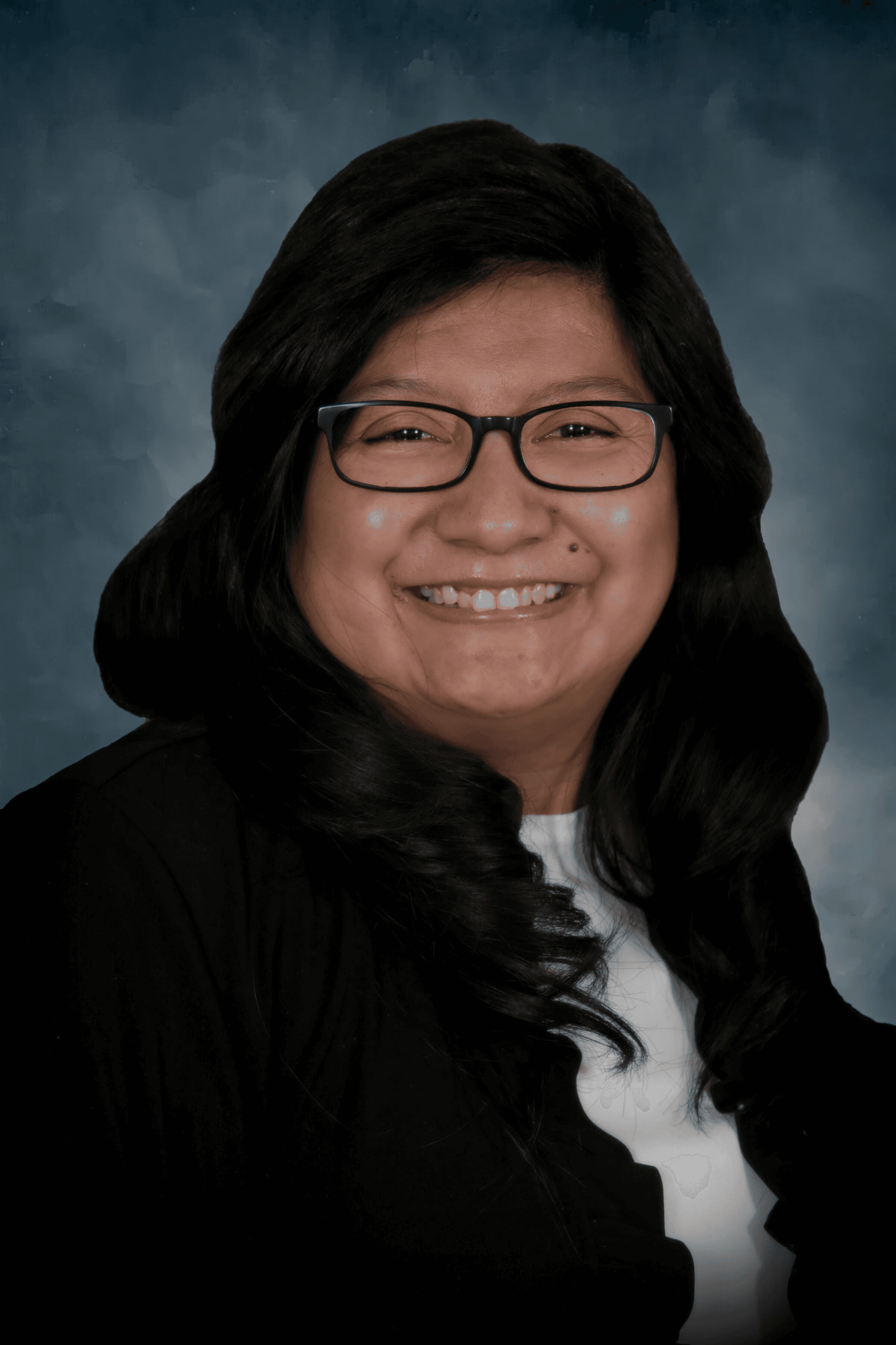 a woman with long hair smiling