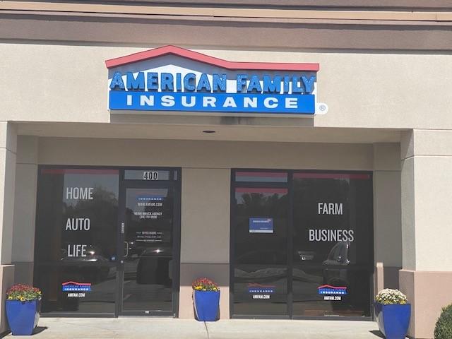 a store front with a blue sign