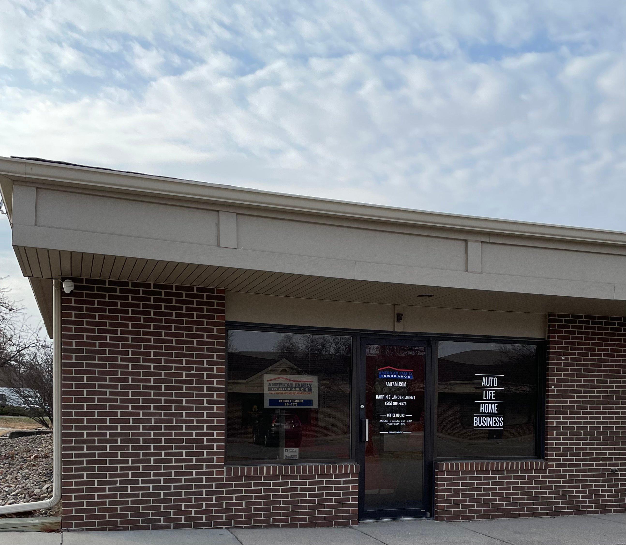 a brick building with a sign on the front