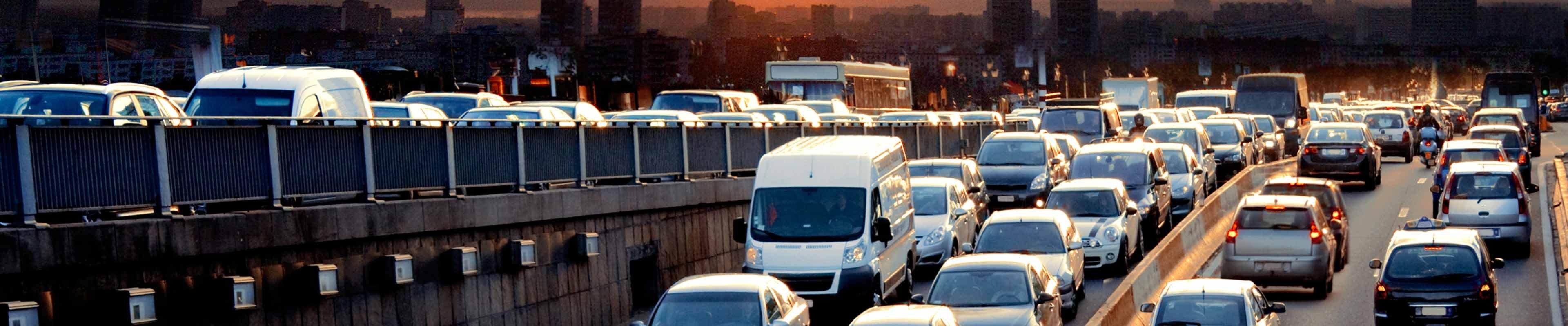 gridlock on a commute with city in the background