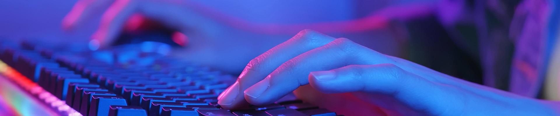 a close-up of a hand holding a keyboard