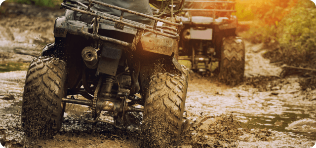 ATV in a muddy area