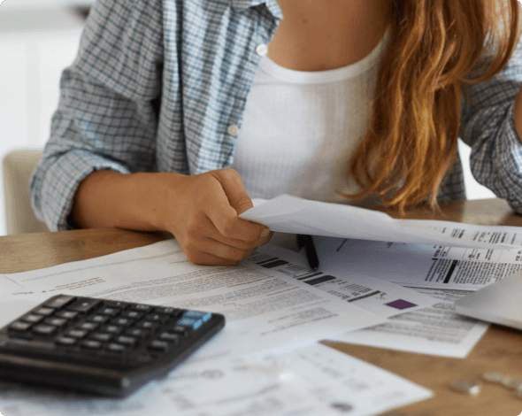 a woman looking over documents