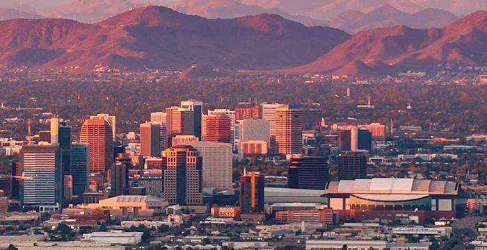 a city with mountains in the background